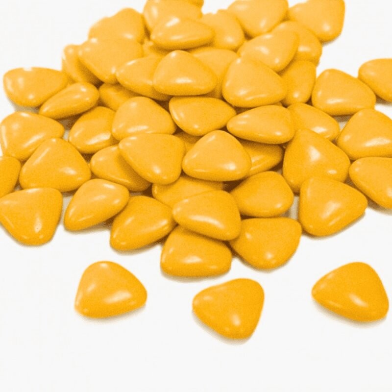 Dragées cœur chocolat orange abricot pour décoration chaleureuse de mariage