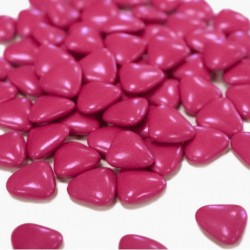 Dragées cœur chocolat rouge framboise pour ambiance gourmande et élégante