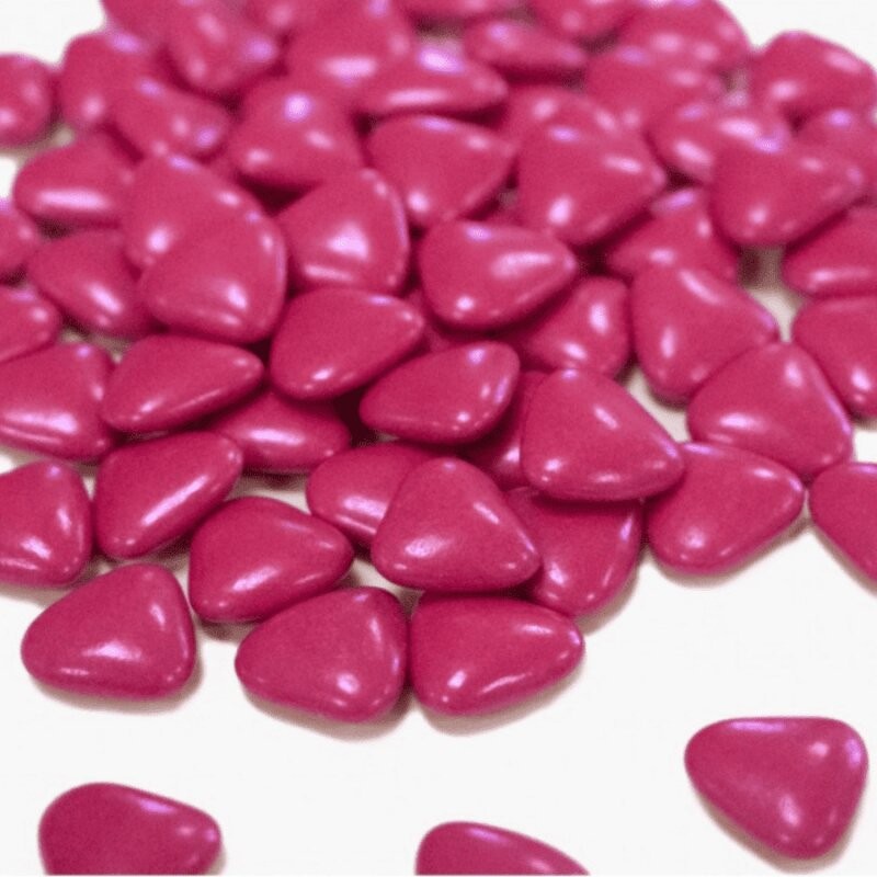 Dragées cœur chocolat rouge framboise pour ambiance gourmande et élégante